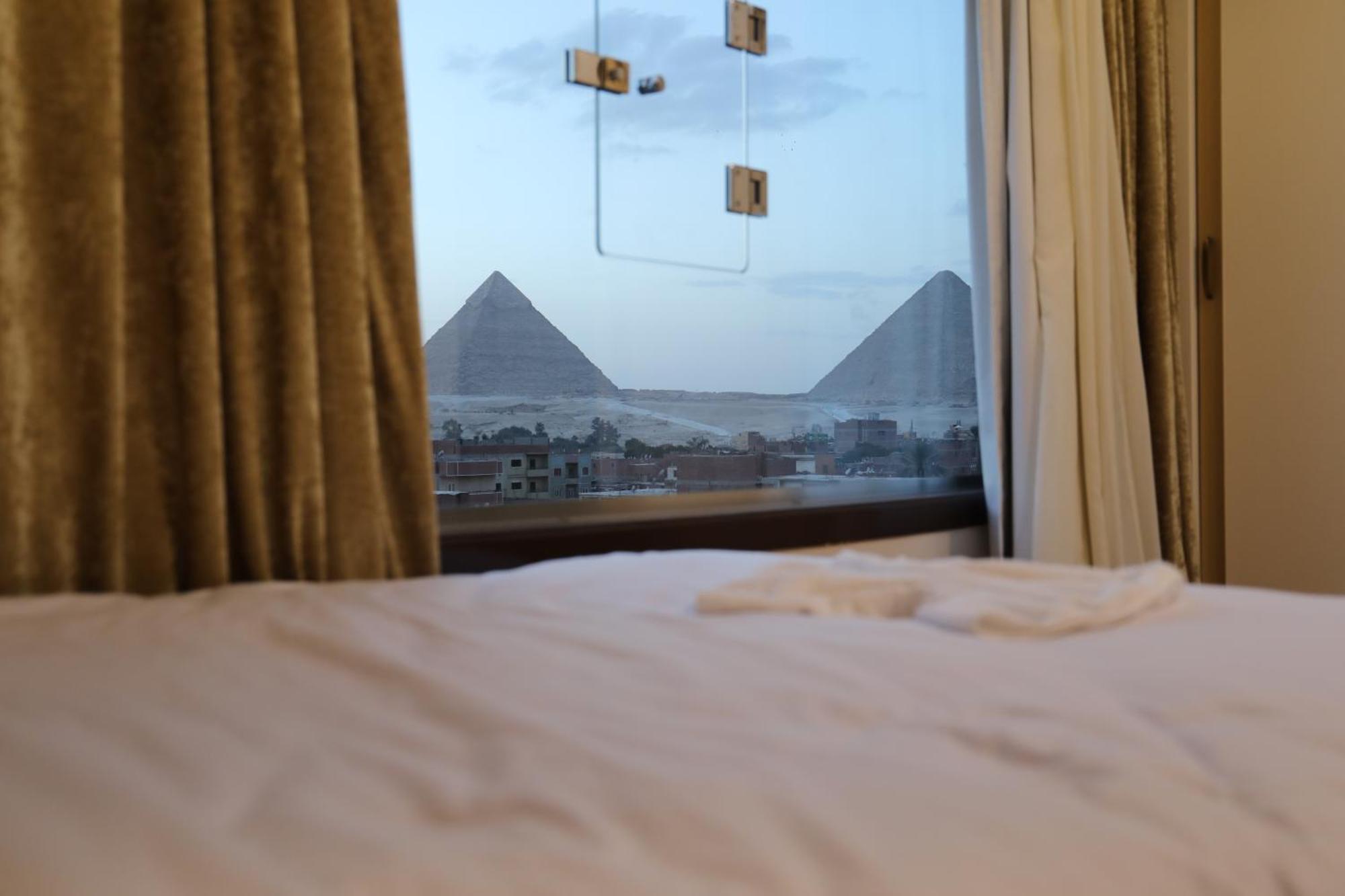Pyramids Heart Hotel Kafret el-Gabal Exteriör bild