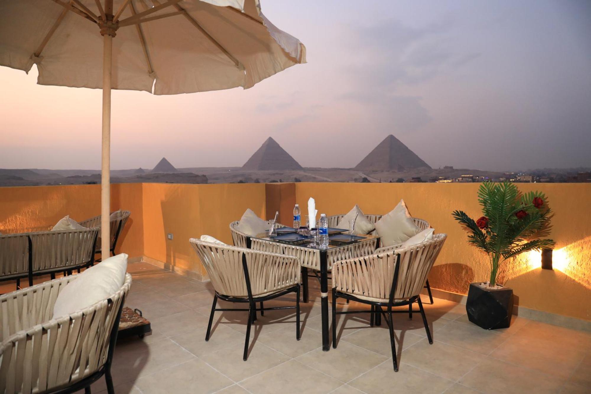 Pyramids Heart Hotel Kafret el-Gabal Exteriör bild