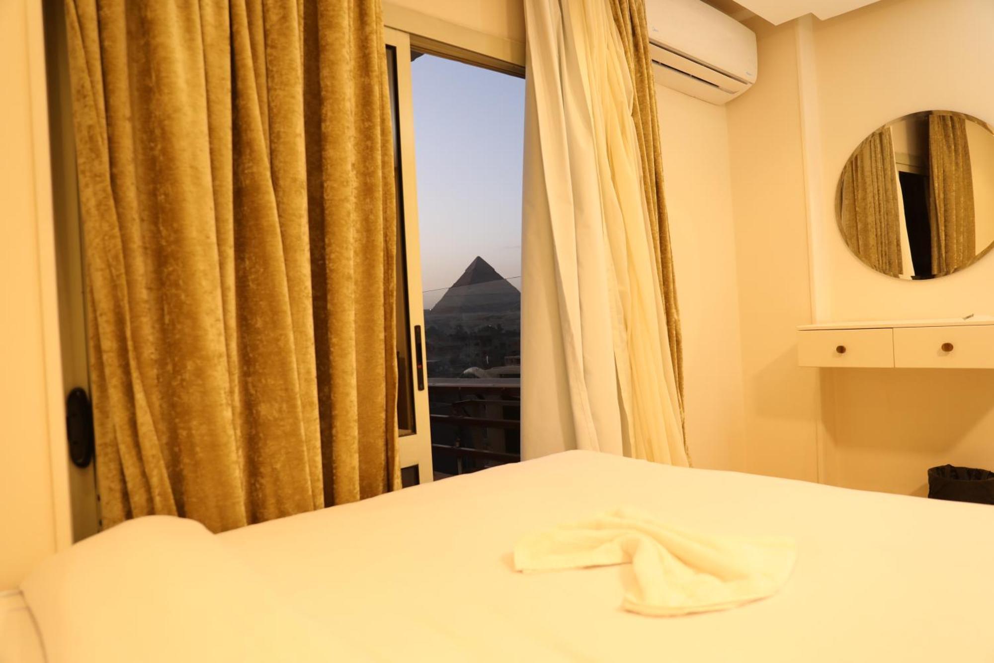 Pyramids Heart Hotel Kafret el-Gabal Exteriör bild