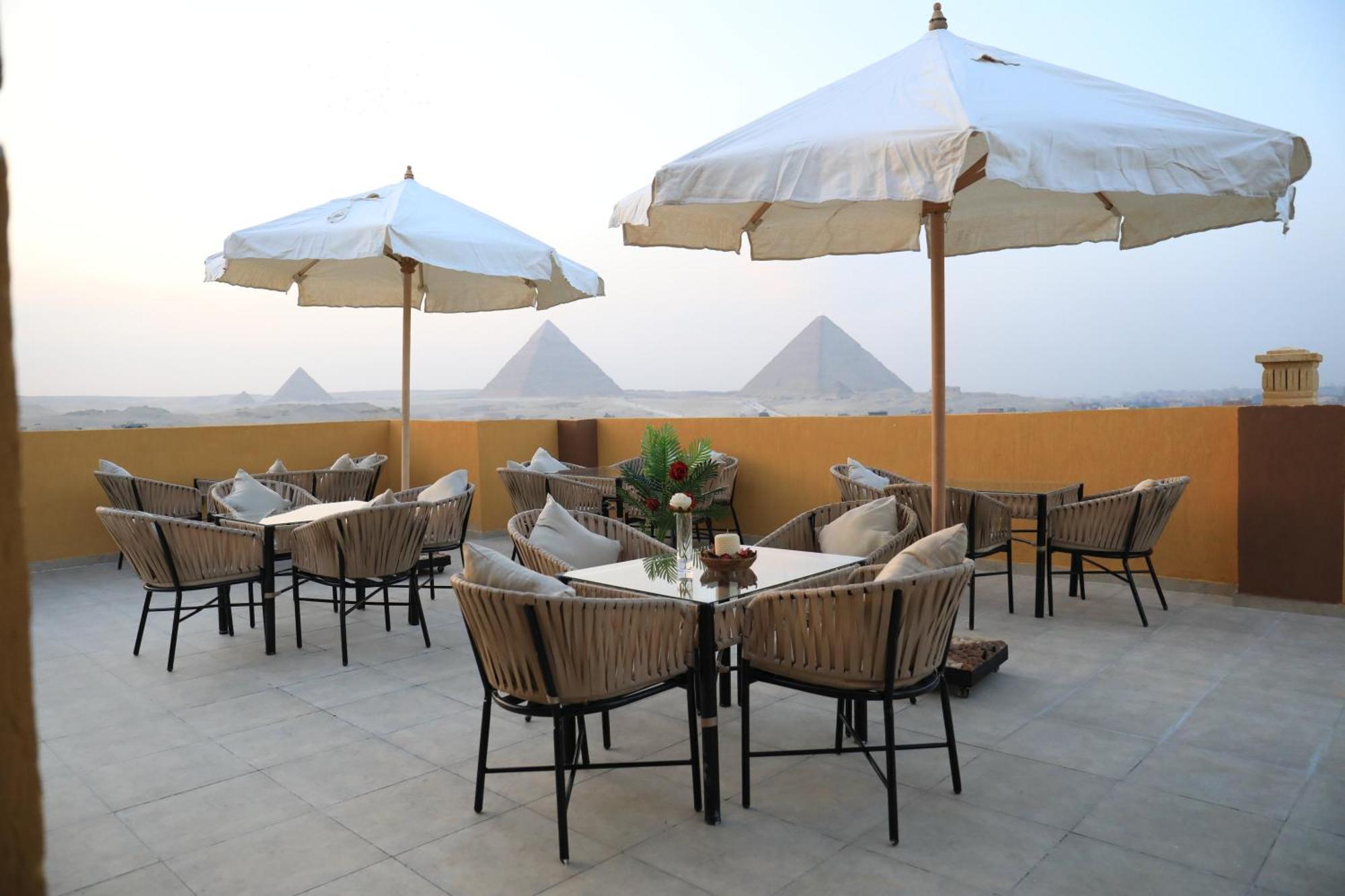Pyramids Heart Hotel Kafret el-Gabal Exteriör bild