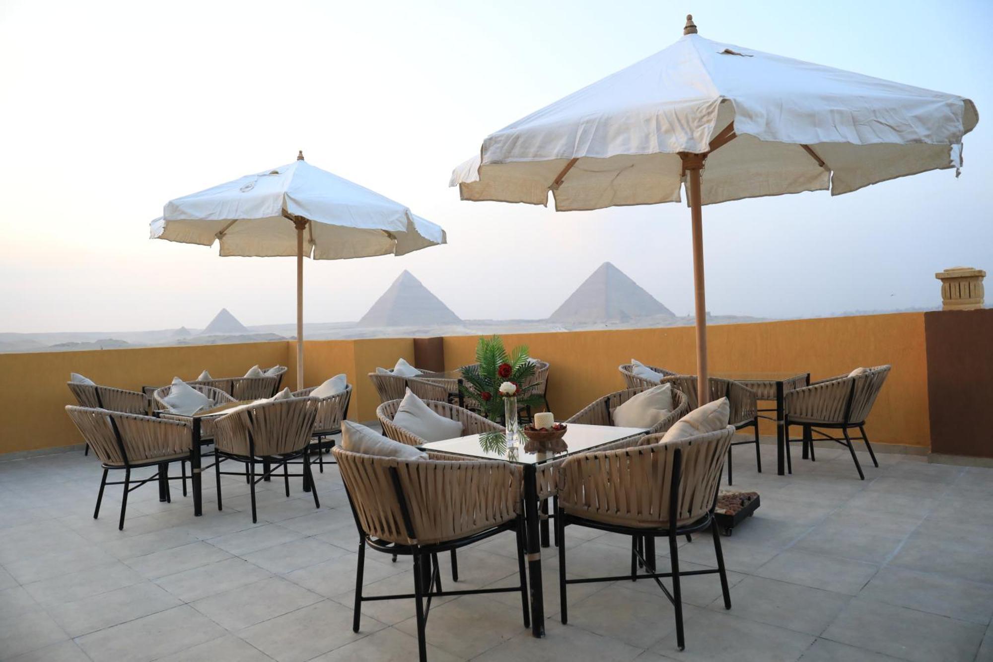 Pyramids Heart Hotel Kafret el-Gabal Exteriör bild